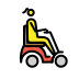 woman in motorized wheelchair: facing right